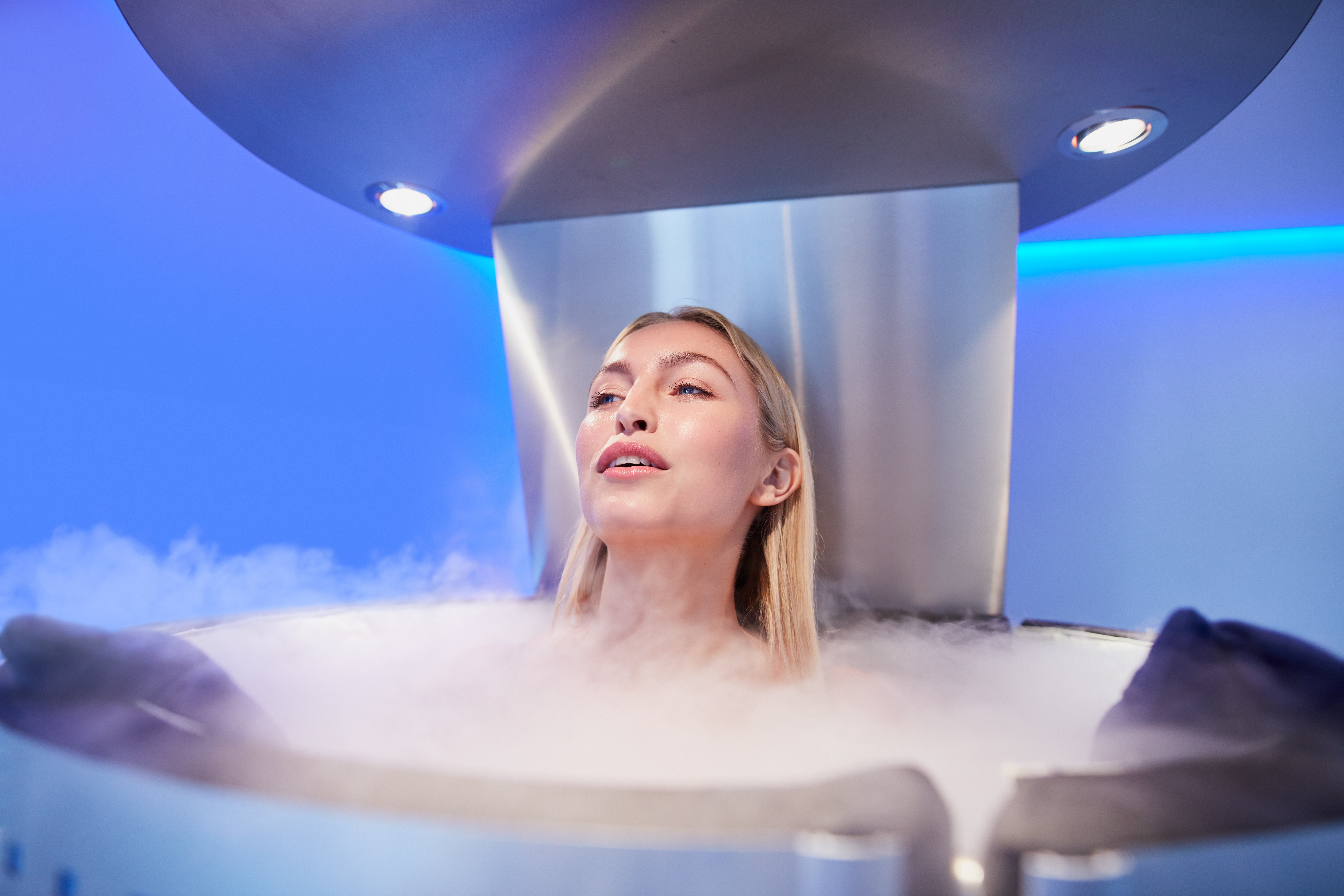 Young woman in a cryo sauna chamber